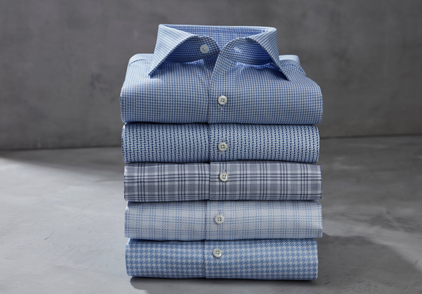 Pile of dress shirts 